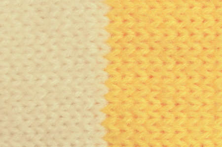 Textile texture of wool is yellow and white in colorの写真素材