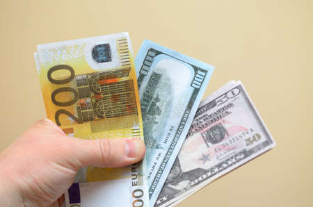 One hundred and fifty dollar bills, spread out in a fan