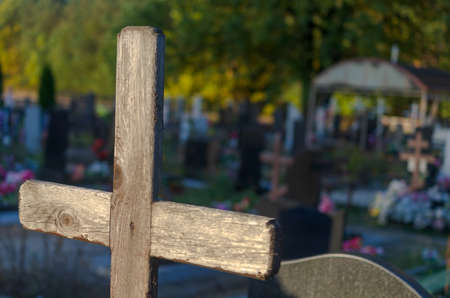 Gloomy crosses on the graves of a cemetery. Halloween.の写真素材