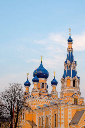 Yellow-blue buildings of the Orthodox Church in the city center.の写真素材
