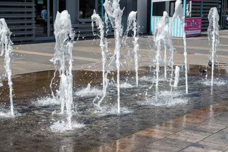 City fountain made from tiled pavement.の写真素材
