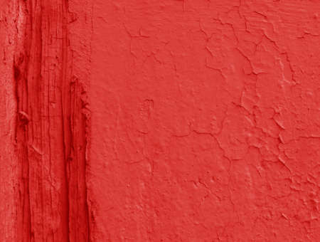 An old red wall with smudges. Abstract background of worn plaster.の写真素材