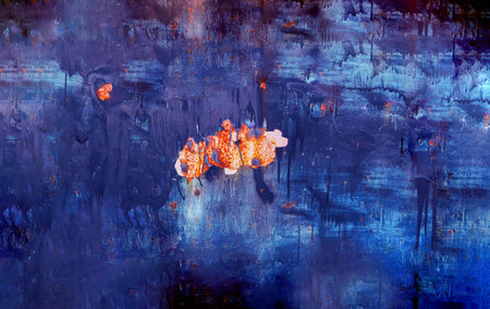 Abstract background of old paint damaged by time and covered with rust spots. Texture of blue worn...