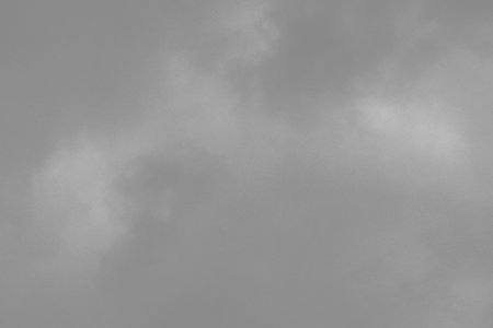 The gray cloud. cloudy sky with heavy clouds in a bad weather. Panorama of cloudy gray sky.の写真素材