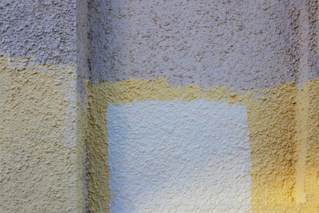 Wall painted with different colors. Texture with different colors.の写真素材