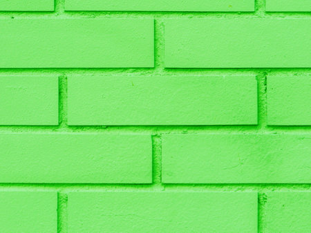 Fragment of a green brick wall close-up.....の写真素材
