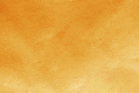 Cardboard background from natural crumpled paper in orange color.....の写真素材
