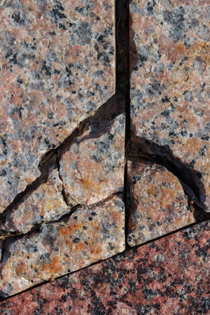 Abstract background of damaged stone floor with cracks.の写真素材