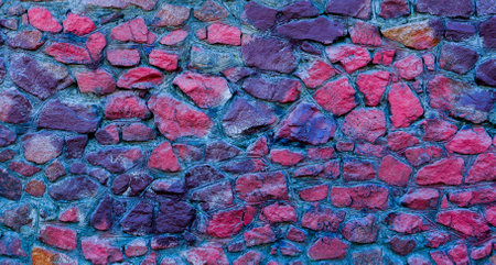 Abstract background of blue and red stones. A wall of blue and red stones.の写真素材
