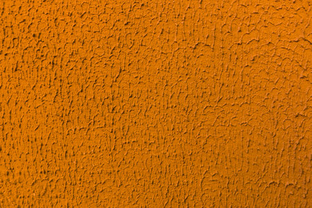 Abstract background of teracote plaster on the wall.の写真素材