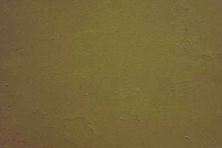 Space for text. Yellow old paint texture on wallの写真素材