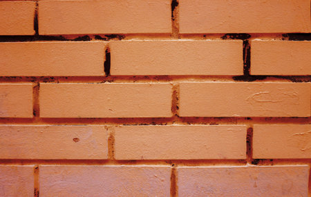old yellow brick wall texture background.の写真素材