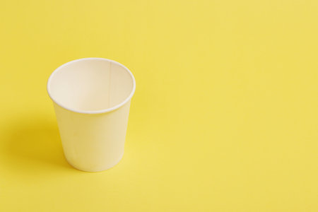 The concept of environmental protection. Copy the space. .Disposable paper cup for coffee and tea on...