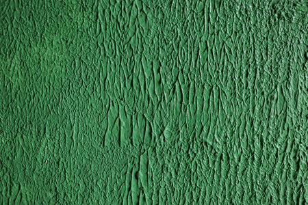 Texture of vertical plaster stripes on a wall. Green cemet wall.の写真素材