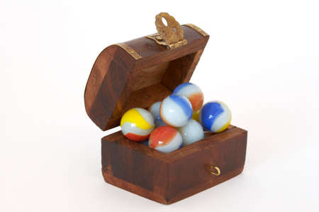 are marbles put within a cofferの写真素材
