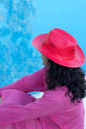 the water is a girl in a swimming pool seeingの写真素材