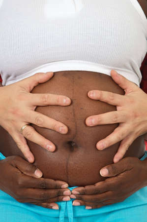 photo of an attractive pregnant woman a over white backgroundの写真素材