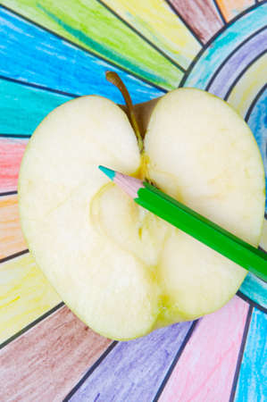 color pencils upon a drawing as a childの写真素材