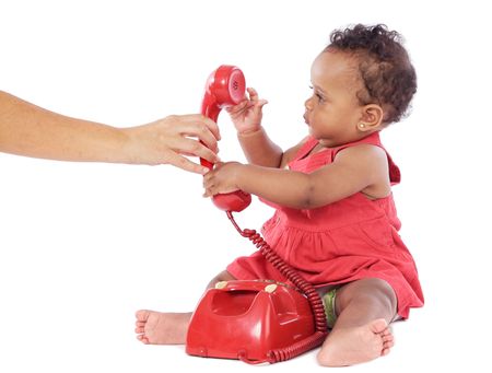 Cute  girl holding a red phoneの写真素材