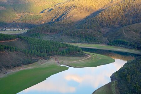 Beautiful landscape - river and mountains with trees -の写真素材