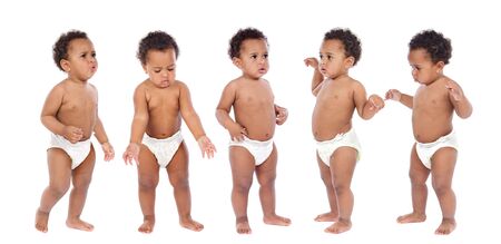 photographic sequence of a baby in diapers a over white backgroundの写真素材