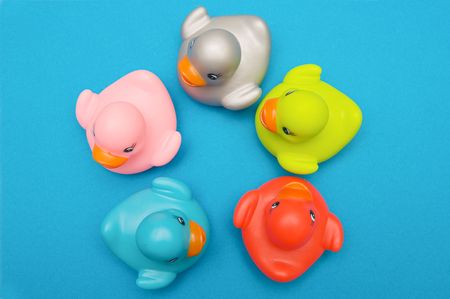 Five ducks plastic multi-colored watched from aboveの写真素材