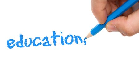 Hand with blue pen on a white backgroundの写真素材