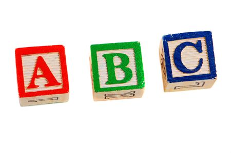 Three toy wooden buckets on a white background