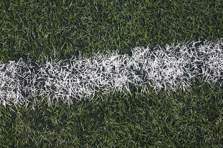 Field of soccer. The artificial grass with one white lineの写真素材