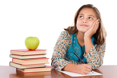 Adorable student thinking on a over white backgroundの写真素材