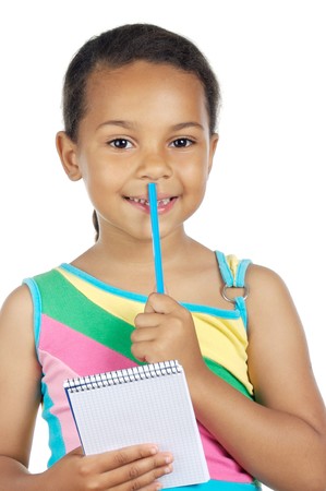 adorable girl writing a over white backgroundの写真素材