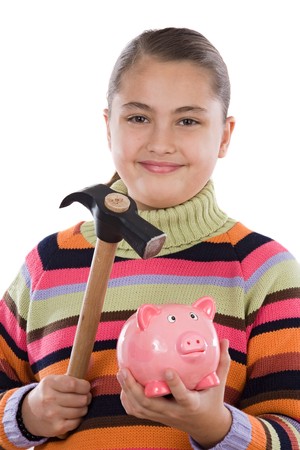 Adorable girl with moneybox and hammer isolated over whiteの写真素材
