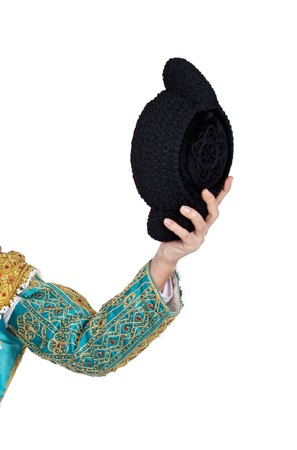 Hand of toreador with hat on a over white backgroundの写真素材