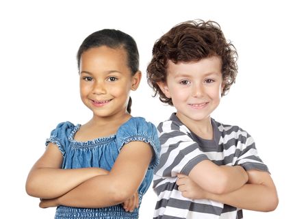 Two children of different races isolated over whiteの写真素材