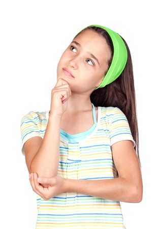 Pensive little girl with blue eyes isolated on white backgroundの写真素材