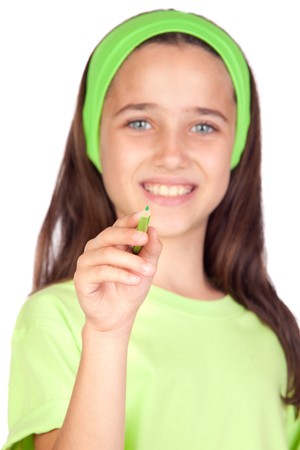 Adorable little girl writing with focus on the pencil -SDF-isolated on white backgroundの写真素材
