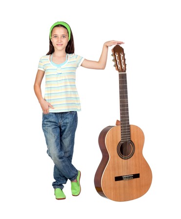 Adorable girl with a big guitar isolated on white backgroundの写真素材