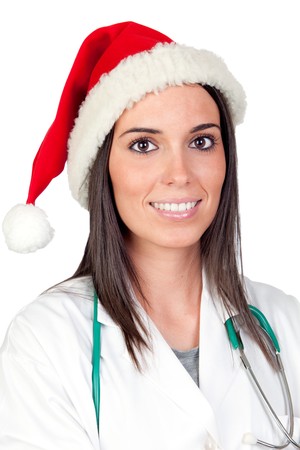 Attractive doctor woman with Christmas cup isolated on white backgroundの写真素材