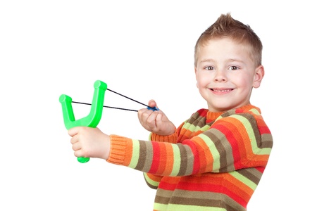 Adorable child with a slingshot isolated on white backgroundの写真素材