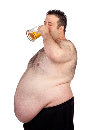 Fat man drinking a jar of beer isolated on white backgroundの写真素材