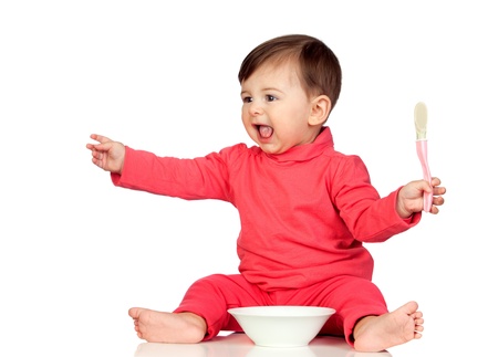Hungry baby girl yelling for food isolated on white backgroundの写真素材