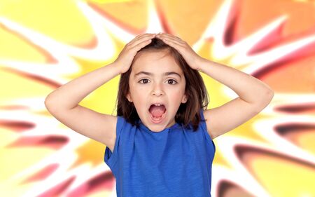 Surprise little girl with a colored background 