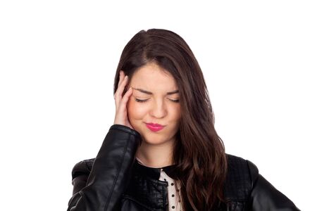 Brunette girl with headache isolated on white backgroundの写真素材