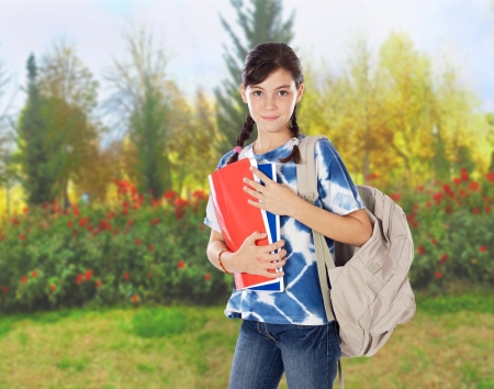 Teenager girl wiht braids going to schoolの写真素材