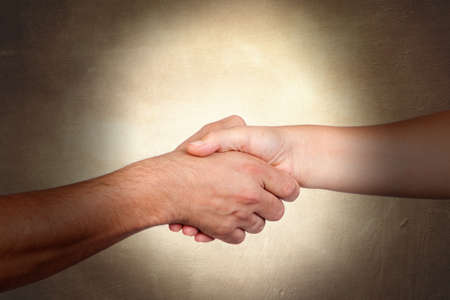 Handshake symbolizing the relationships between peopleの写真素材
