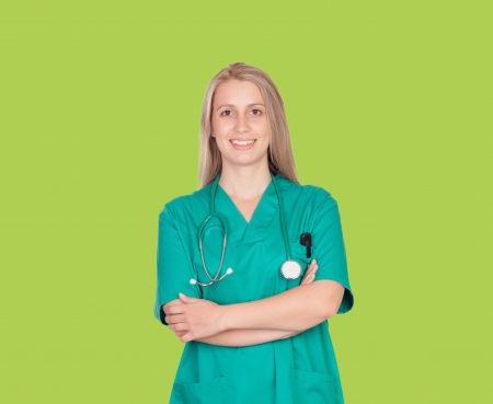 Atractive medical girl on a green backgroundの写真素材