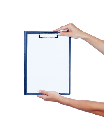 Clipboard with blank paper held by a woman hands isolated on white backgroundの写真素材