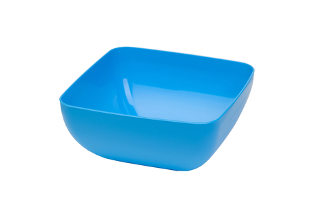 Blue salad bowl isolated on a white backgroundの写真素材