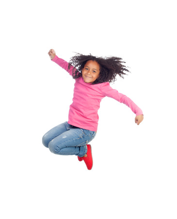 Funny girl jumping isolated on a white backgroundの写真素材