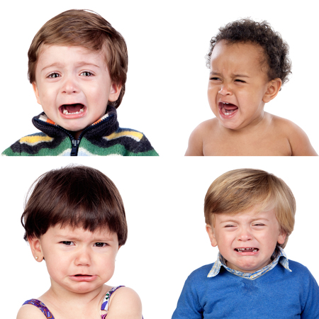 Photo collage of four children criyng isolated on white backgroundの写真素材